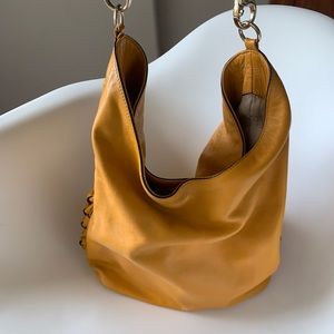 Coccinelle mustanrd bag